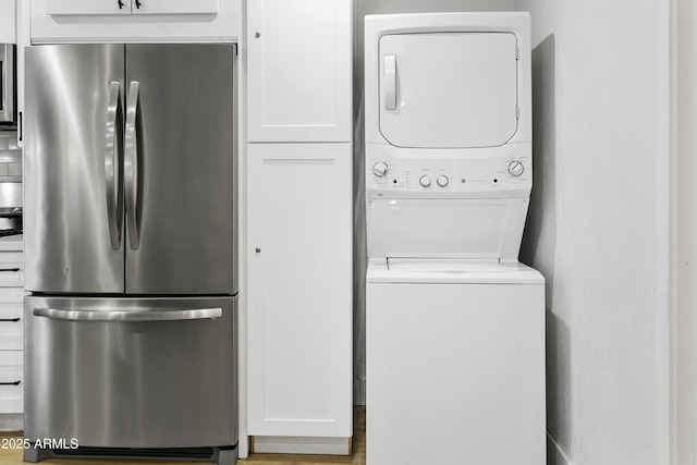 3139 N 40th St, Phoenix, AZ 85018 - washroom featuring stacked washer and clothes dryer