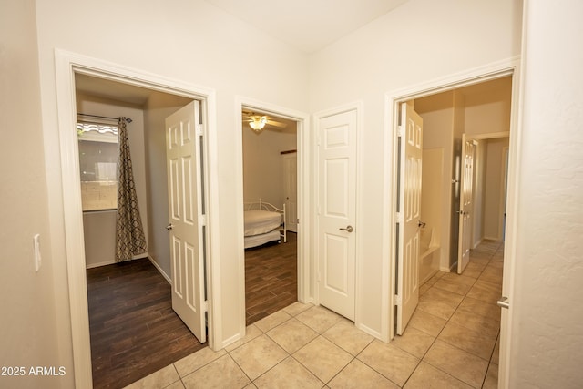 40808 N Raleigh Ct, Anthem, AZ 85086 - hallway featuring light tile patterned flooring