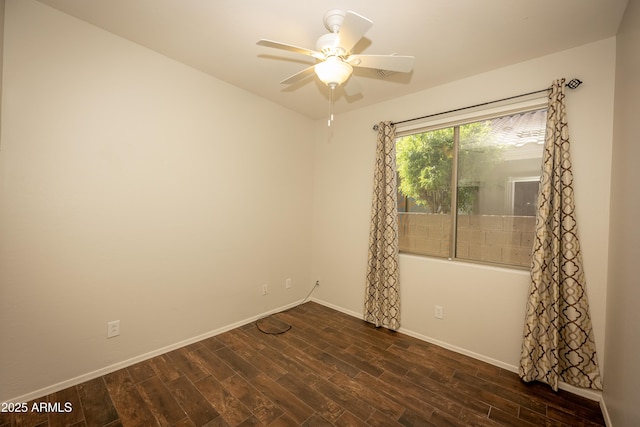 40808 N Raleigh Ct, Anthem, AZ 85086 - unfurnished room with dark wood-style floors, baseboards, and a ceiling fan