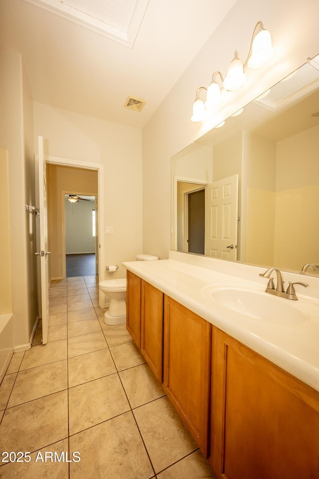 40808 N Raleigh Ct, Anthem, AZ 85086 - bathroom with toilet, tile patterned flooring, and vanity