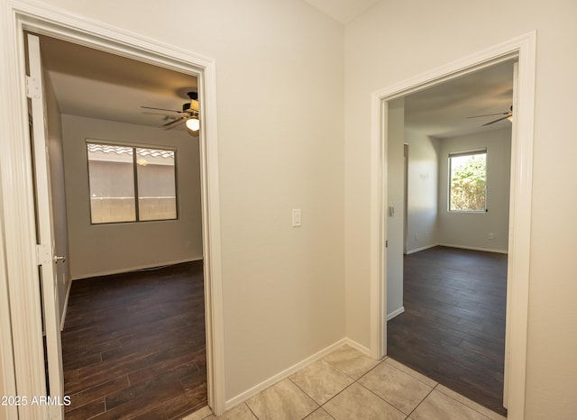 40808 N Raleigh Ct, Anthem, AZ 85086 - hallway with wood finished floors and baseboards