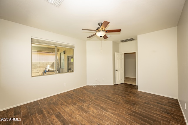 40808 N Raleigh Ct, Anthem, AZ 85086 - empty room with wood finished floors, a ceiling fan, and baseboards