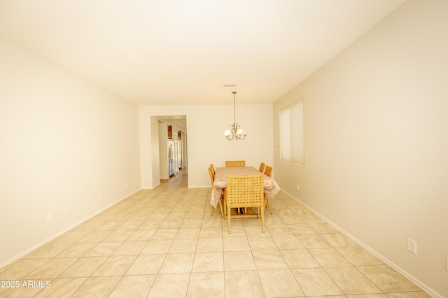 40808 N Raleigh Ct, Anthem, AZ 85086 - dining area featuring a chandelier and baseboards