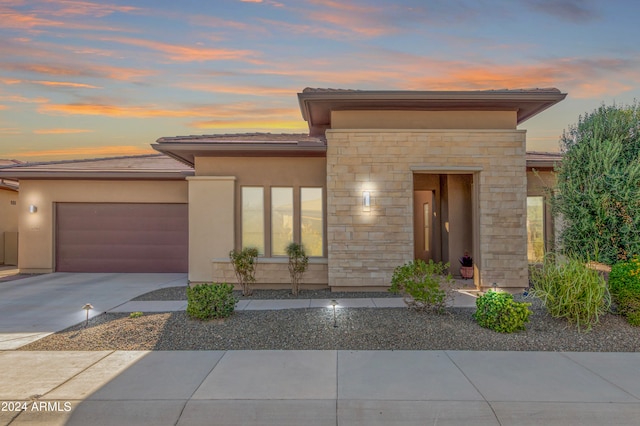 view of front of home featuring a garage