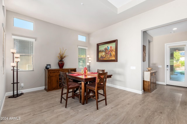 dining space with a healthy amount of sunlight and light wood-type flooring