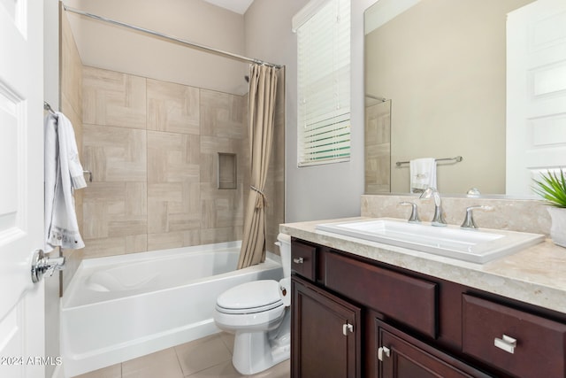 full bathroom with shower / bath combo with shower curtain, tile patterned flooring, toilet, and vanity