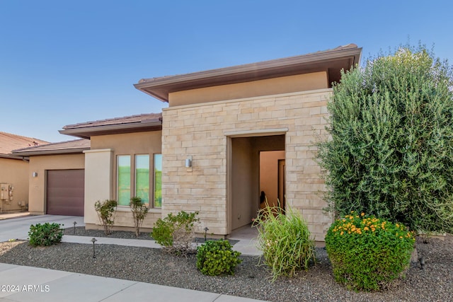 view of front of house with a garage