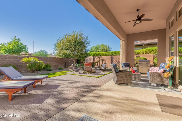 view of patio / terrace featuring ceiling fan