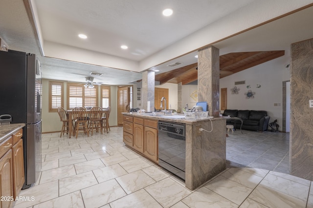 1285 E Mcmurray Blvd, Casa Grande, AZ 85122 - kitchen with black dishwasher, freestanding refrigerator, a sink, open floor plan, and recessed lighting
