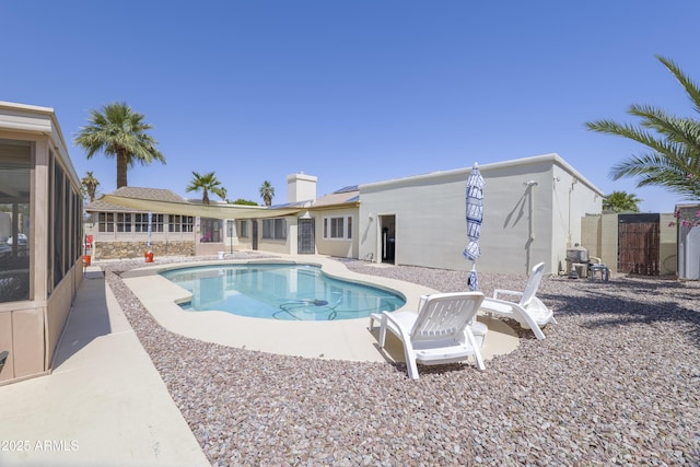 1285 E Mcmurray Blvd, Casa Grande, AZ 85122 - view of swimming pool with a patio and a sunroom