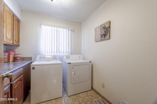 1285 E Mcmurray Blvd, Casa Grande, AZ 85122 - laundry room with washer and clothes dryer, cabinet space, and light tile patterned floors