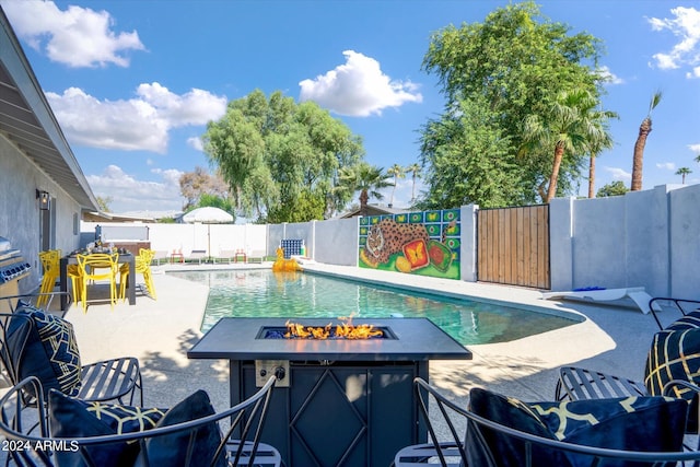 view of pool featuring a patio