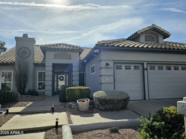 view of front of home with a garage