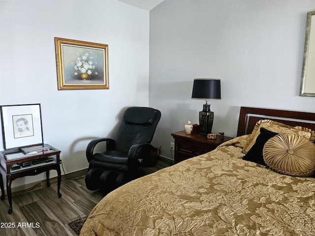 bedroom featuring dark wood-type flooring