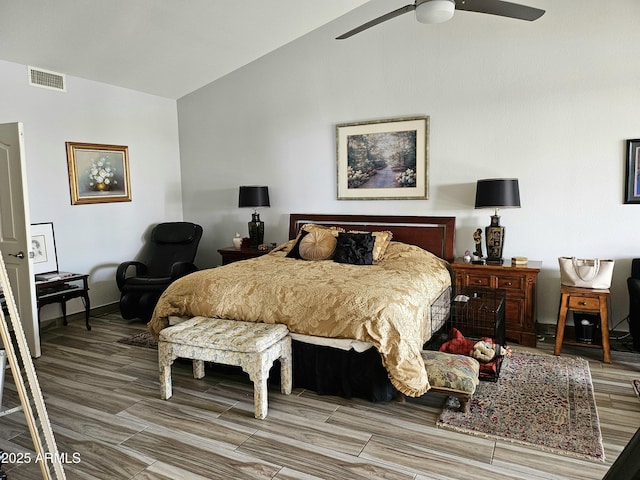 bedroom featuring ceiling fan and lofted ceiling