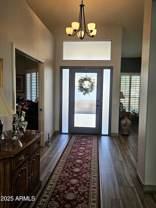 foyer with a notable chandelier