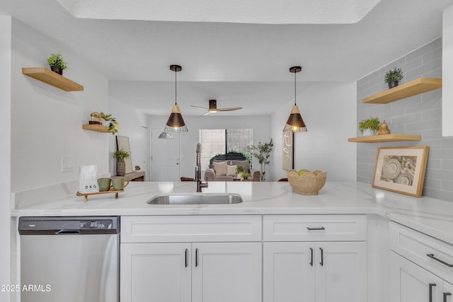 15435 N 28th St Unit 3, Phoenix, AZ 85032 - kitchen featuring open shelves, dishwasher, a peninsula, white cabinetry, and pendant lighting