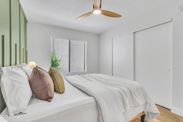 15435 N 28th St Unit 3, Phoenix, AZ 85032 - bedroom featuring light wood finished floors, a closet, and ceiling fan