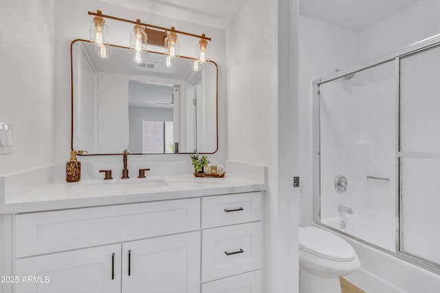15435 N 28th St Unit 3, Phoenix, AZ 85032 - bathroom featuring toilet, vanity, and shower / bath combination with glass door