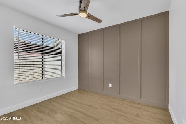 15435 N 28th St Unit 3, Phoenix, AZ 85032 - spare room with ceiling fan, light wood finished floors, and baseboards