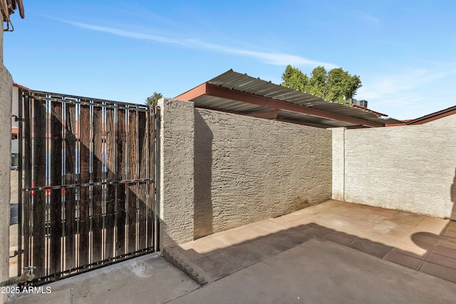 15435 N 28th St Unit 3, Phoenix, AZ 85032 - view of patio / terrace with a gate
