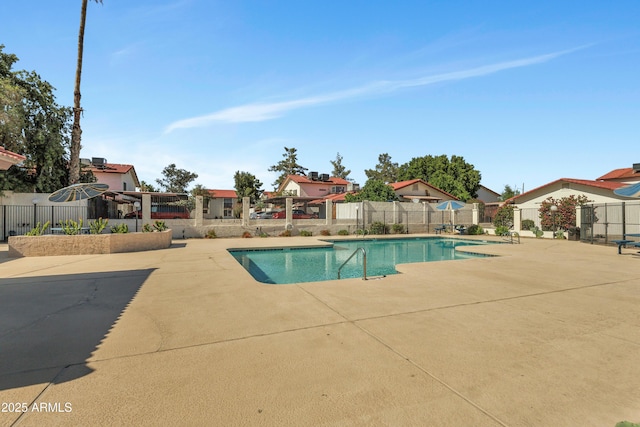 15435 N 28th St Unit 3, Phoenix, AZ 85032 - community pool with a patio area, fence, and a residential view