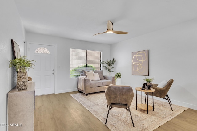 15435 N 28th St Unit 3, Phoenix, AZ 85032 - living room featuring ceiling fan, light wood-type flooring, and baseboards
