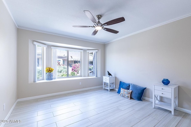14300 W Bell Rd Unit 222, Surprise, AZ 85374 - interior space with baseboards, ornamental molding, ceiling fan, and wood finished floors