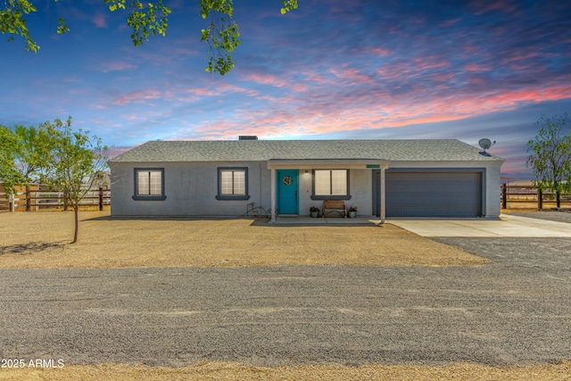 view of front of property featuring a garage