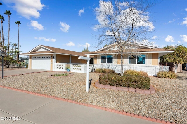 ranch-style home with a garage