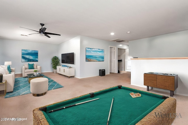 recreation room featuring carpet floors, visible vents, and a ceiling fan