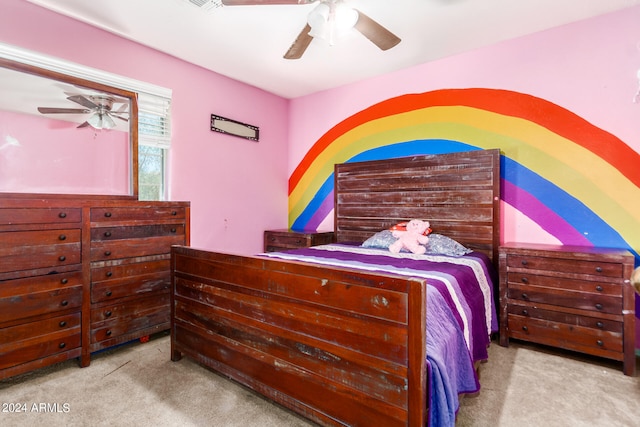 bedroom featuring light carpet and ceiling fan