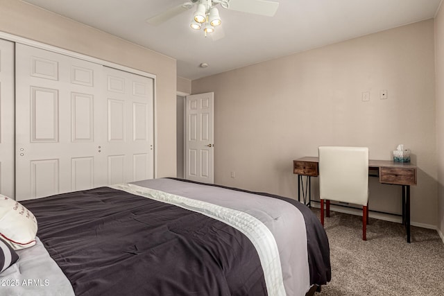 carpeted bedroom with ceiling fan and a closet