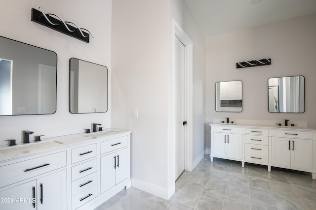 bathroom featuring vanity and tile patterned floors