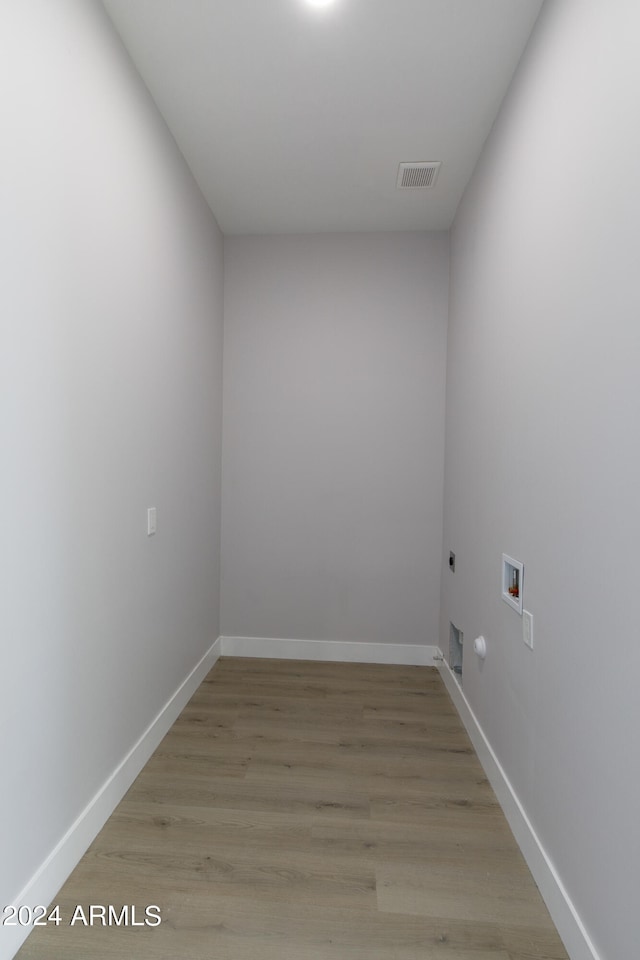 unfurnished room featuring light wood-type flooring