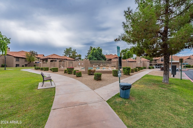 view of community featuring a yard