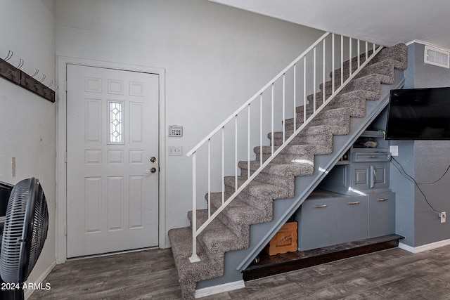 entrance foyer featuring dark hardwood / wood-style flooring