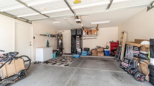 garage with a garage door opener, fridge, and water heater