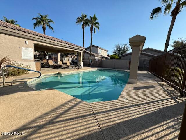 view of pool featuring a patio