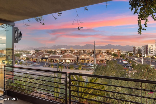 balcony at dusk with a mountain view