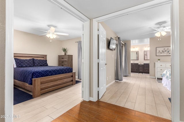 bedroom with ceiling fan and ensuite bathroom