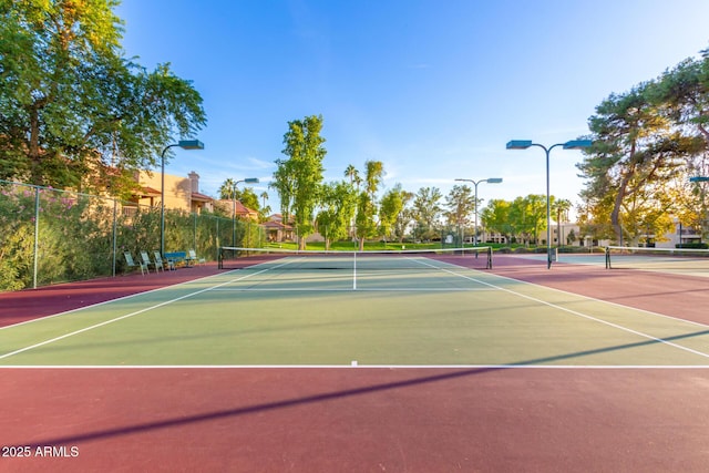 view of tennis court with basketball court