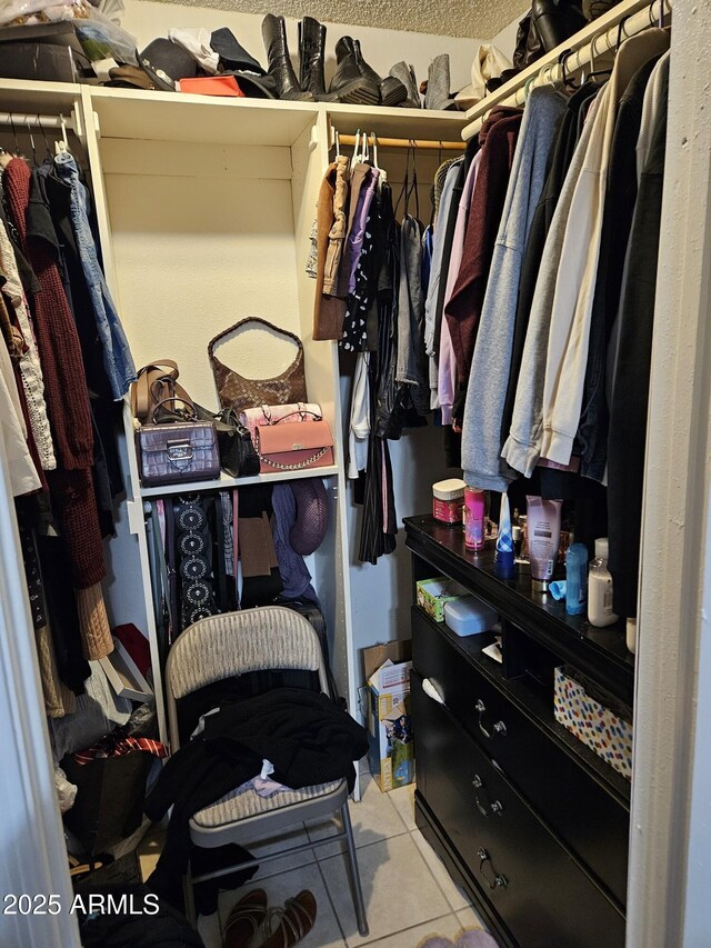 4507 E Saint Catherine Ave, Phoenix, AZ 85042 - spacious closet with tile patterned floors