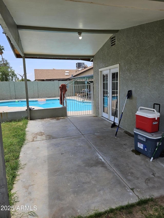 4507 E Saint Catherine Ave, Phoenix, AZ 85042 - view of pool with a patio area, a fenced backyard, and central AC