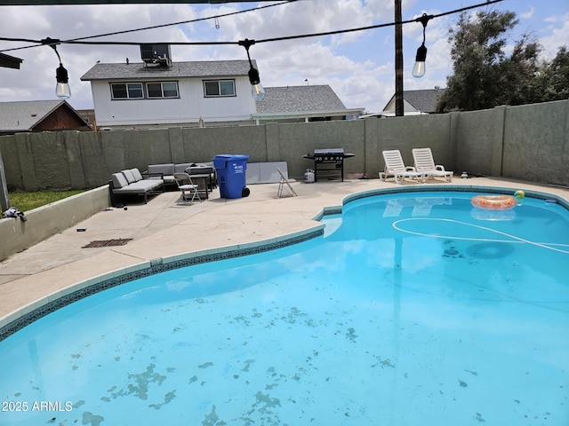 4507 E Saint Catherine Ave, Phoenix, AZ 85042 - view of pool featuring a patio, a fenced backyard, and grilling area