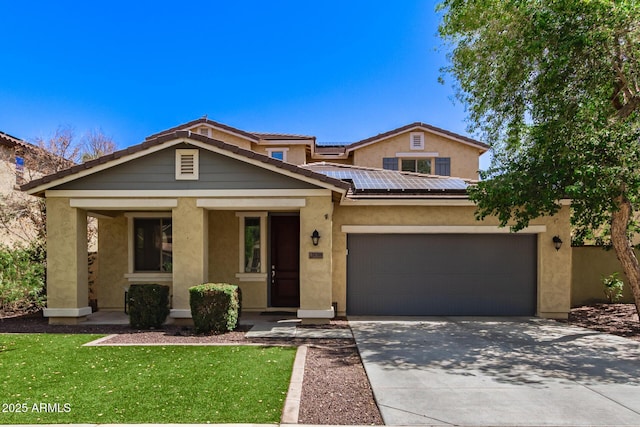 20709 W Delaney Dr, Buckeye, AZ 85396 - view of front of property with stucco siding, an attached garage, roof mounted solar panels, driveway, and a tiled roof