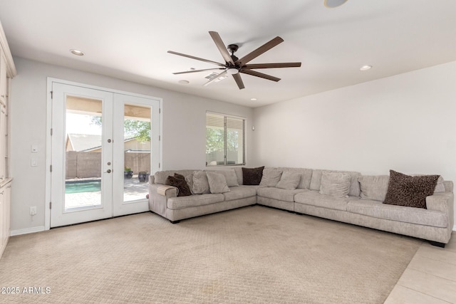 20709 W Delaney Dr, Buckeye, AZ 85396 - living room with french doors, ceiling fan, recessed lighting, and light tile patterned floors