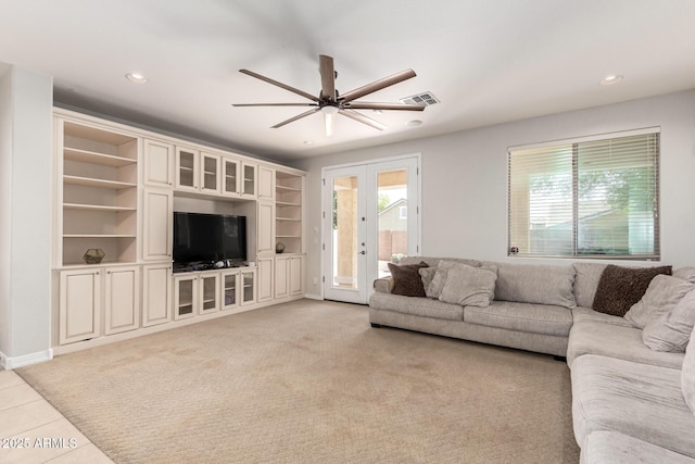 20709 W Delaney Dr, Buckeye, AZ 85396 - living room with a ceiling fan, recessed lighting, light carpet, and french doors