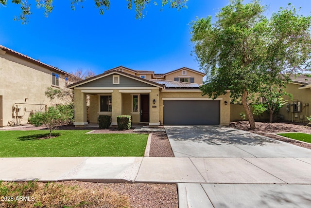 20709 W Delaney Dr, Buckeye, AZ 85396 - view of front of house with stucco siding, driveway, roof mounted solar panels, and a porch