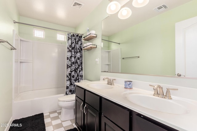 20709 W Delaney Dr, Buckeye, AZ 85396 - full bathroom featuring double vanity, shower / bath combo with shower curtain, and tile patterned floors